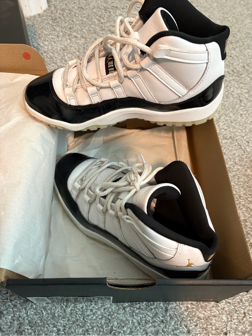 Jordan Black and White High-Top Sneakers with Gold Jumpman